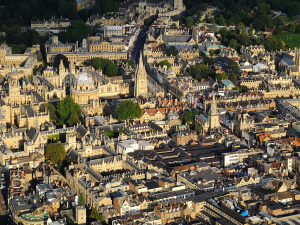 aerial view of Oxford, UK. Lots of stone Gothic-looking buildings and churches, organized in squares